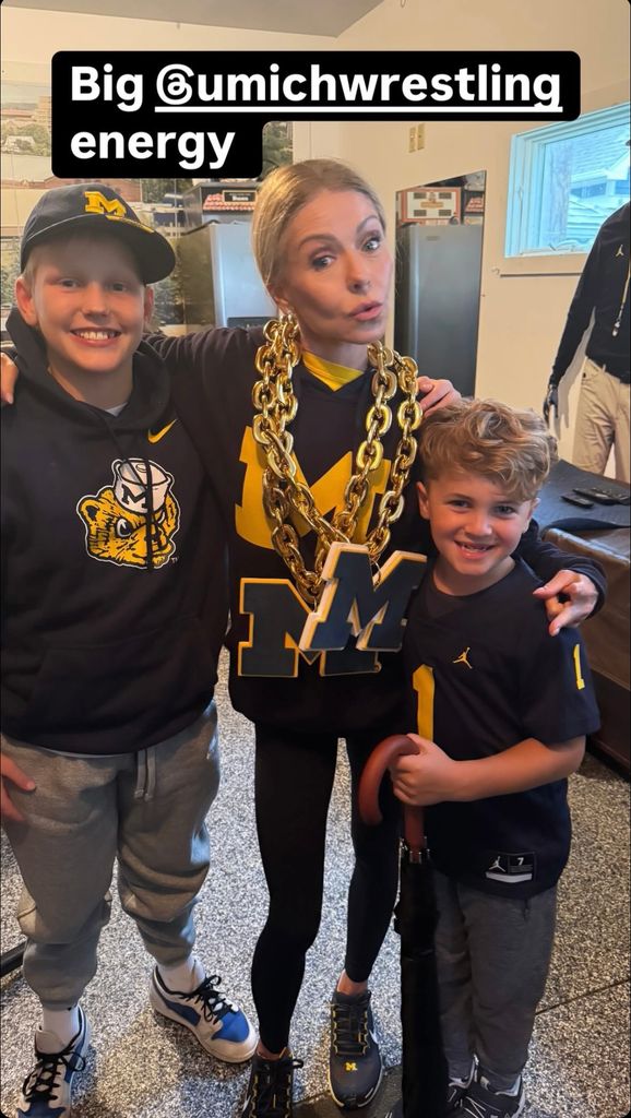 Kelly Ripa poses in University of Michigan merch at a recent University game, shared on Instagram Stories