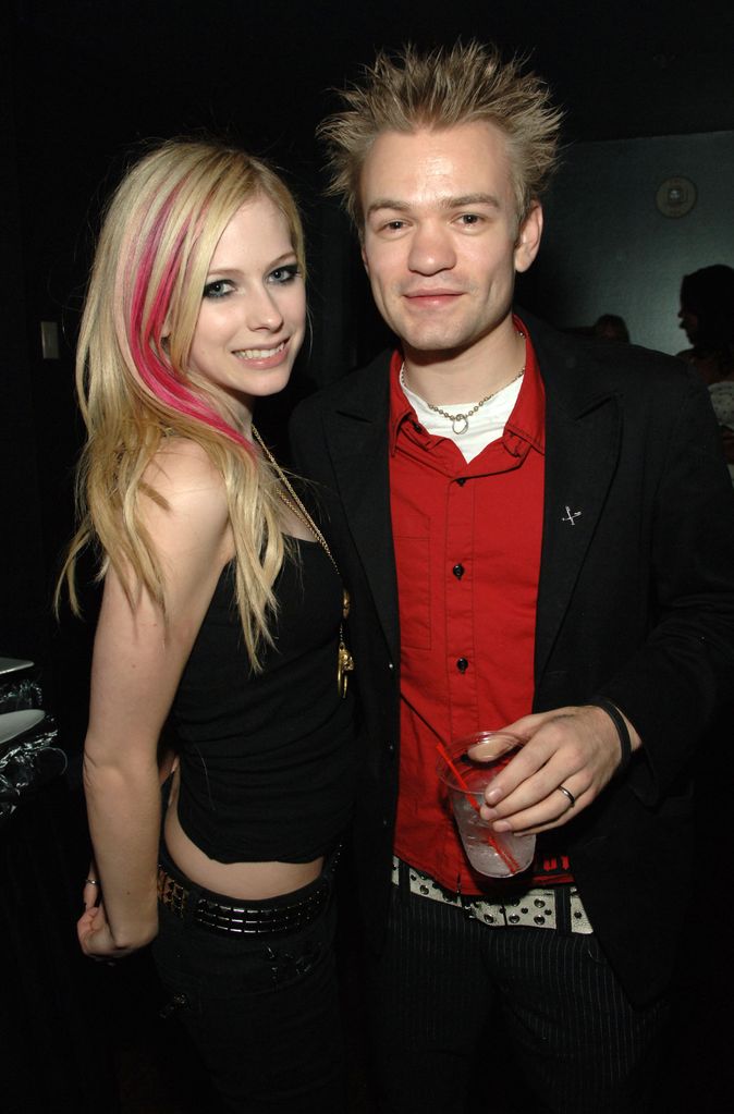 Singers Avril Lavigne and Deryck Whibley attending a Maroon 5 concert 