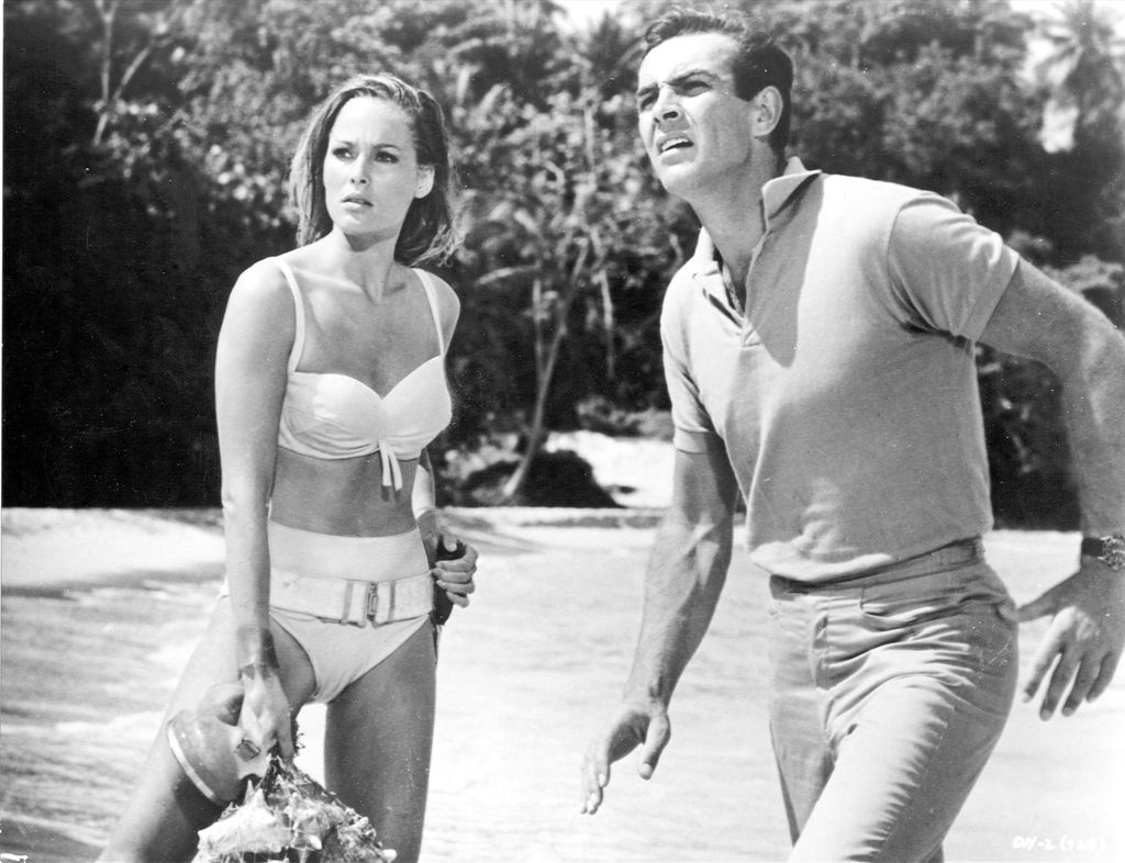 Black-and-white photo of Ursula Andress and Sean Connery in Dr. No
