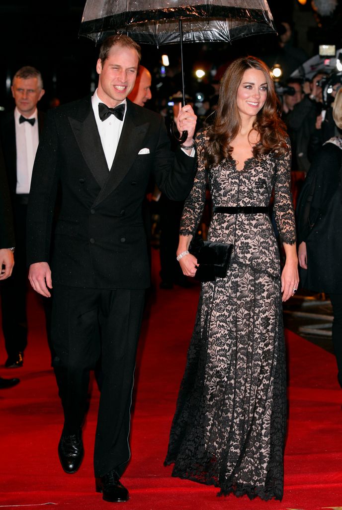 Kate on red carpet in black lace dress with william