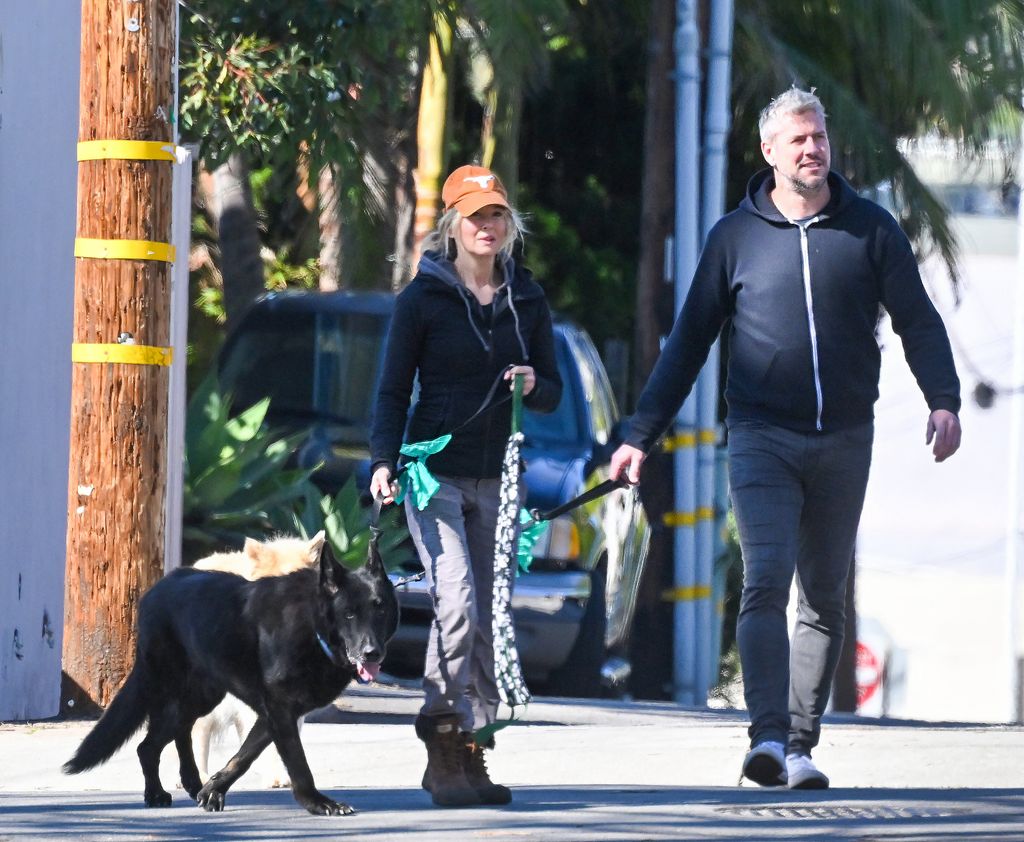Renée Zellweger and Ant Anstead are seen walking her dogs Charlotte and Chester