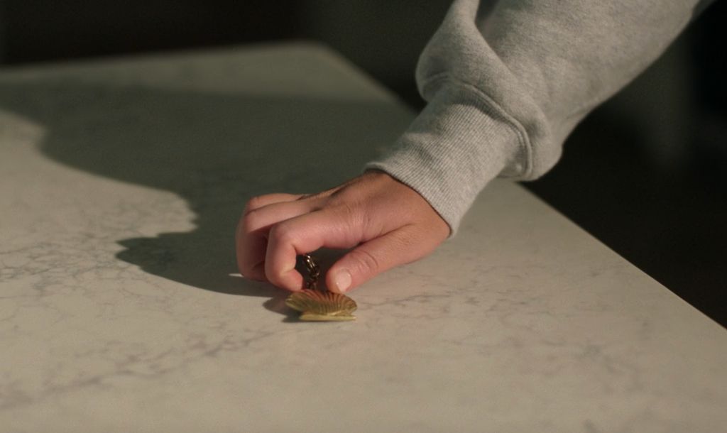 The Coach shell charm keyring on the summer i turned pretty