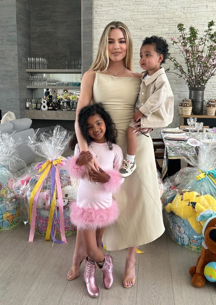 Photo shared by Khloé Kardashian on Instagram Easter Sunday, posing with her kids True and Tatum