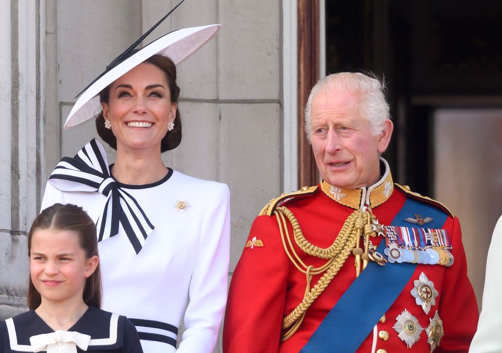 Kate standing next to Charles on palace balcony