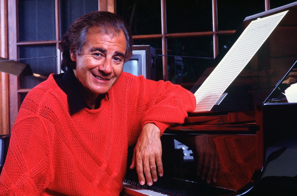 Portrait of composer Lalo Schifrin as he poses at home studio, circa January 1, 1989