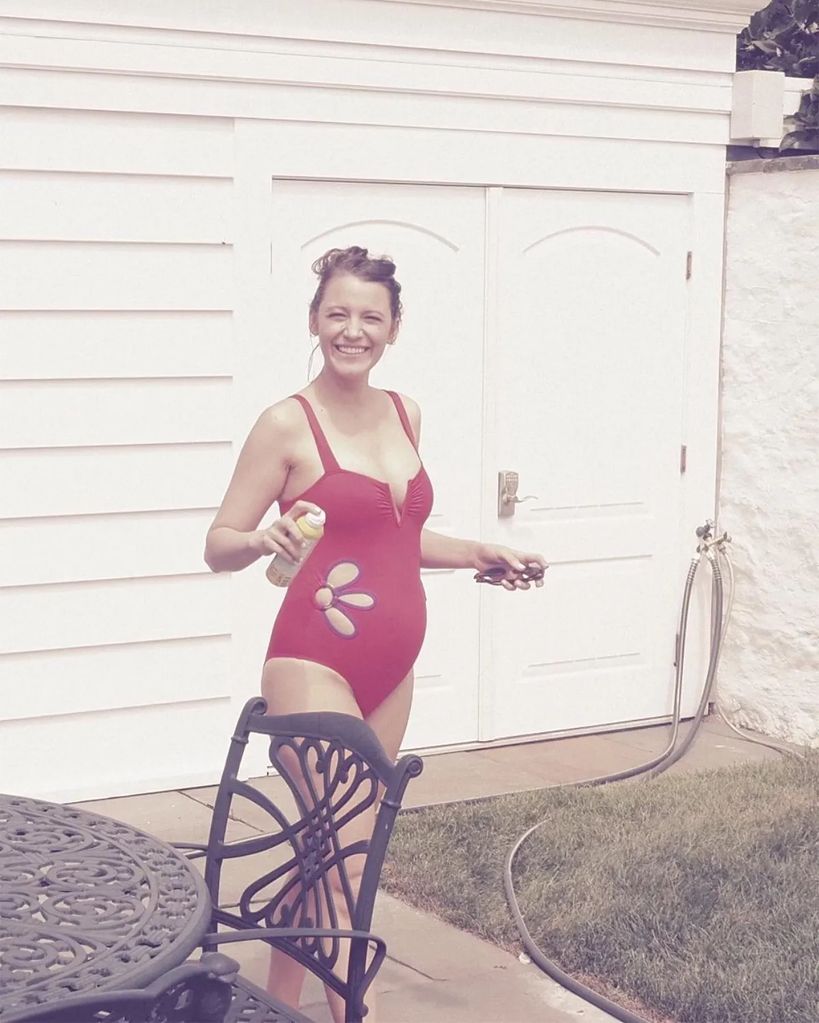 Blake stuns in a red swimsuit