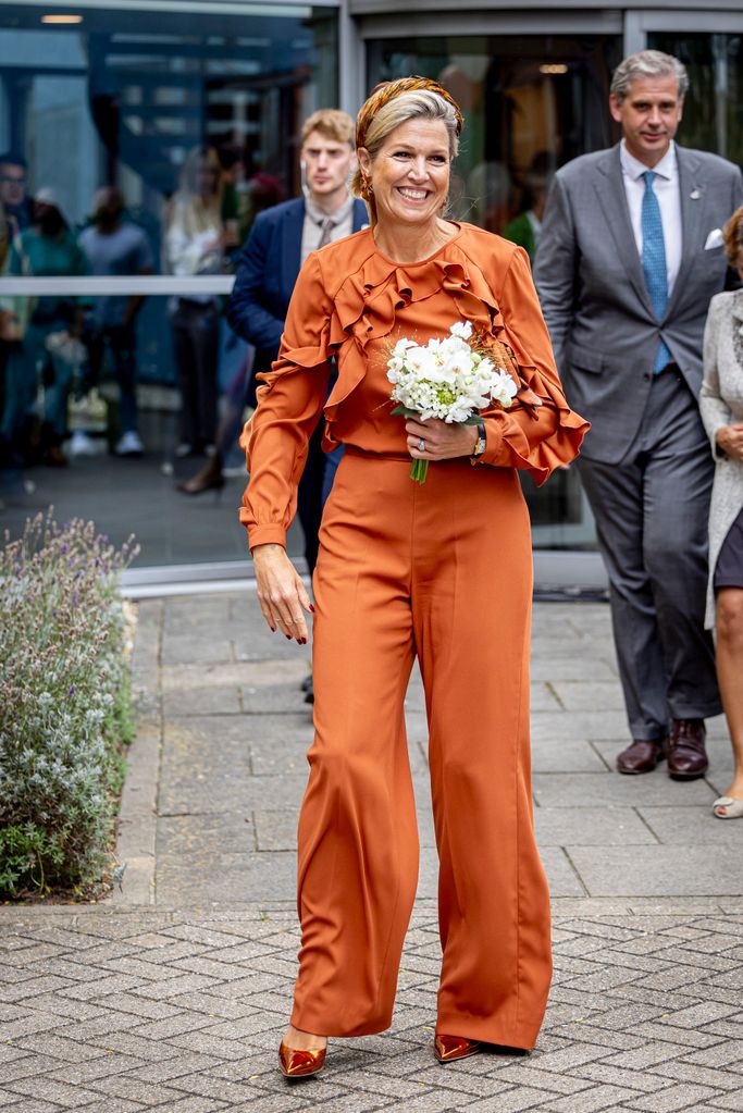 Queen Maxima in burnt orange co-ord