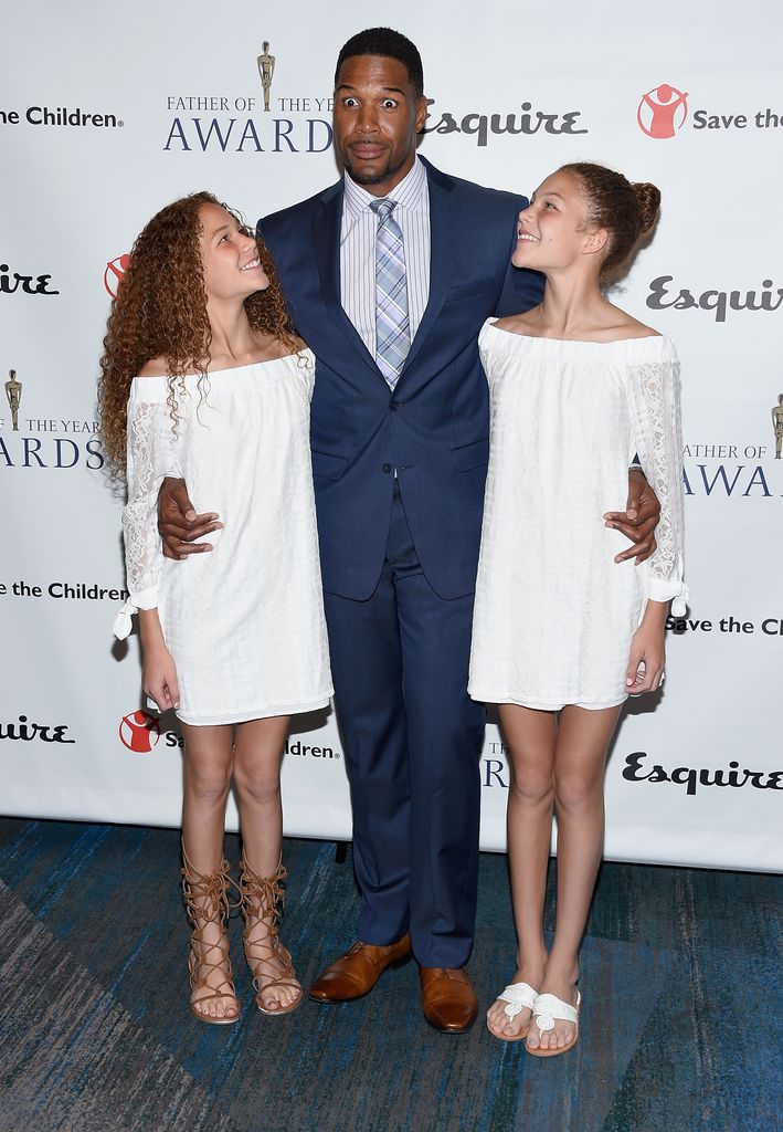 Michael Strahan and daughters look up to him on red carpet