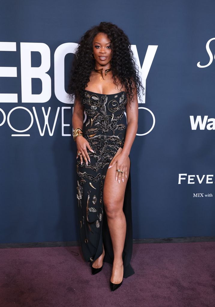 ari lennox black gown