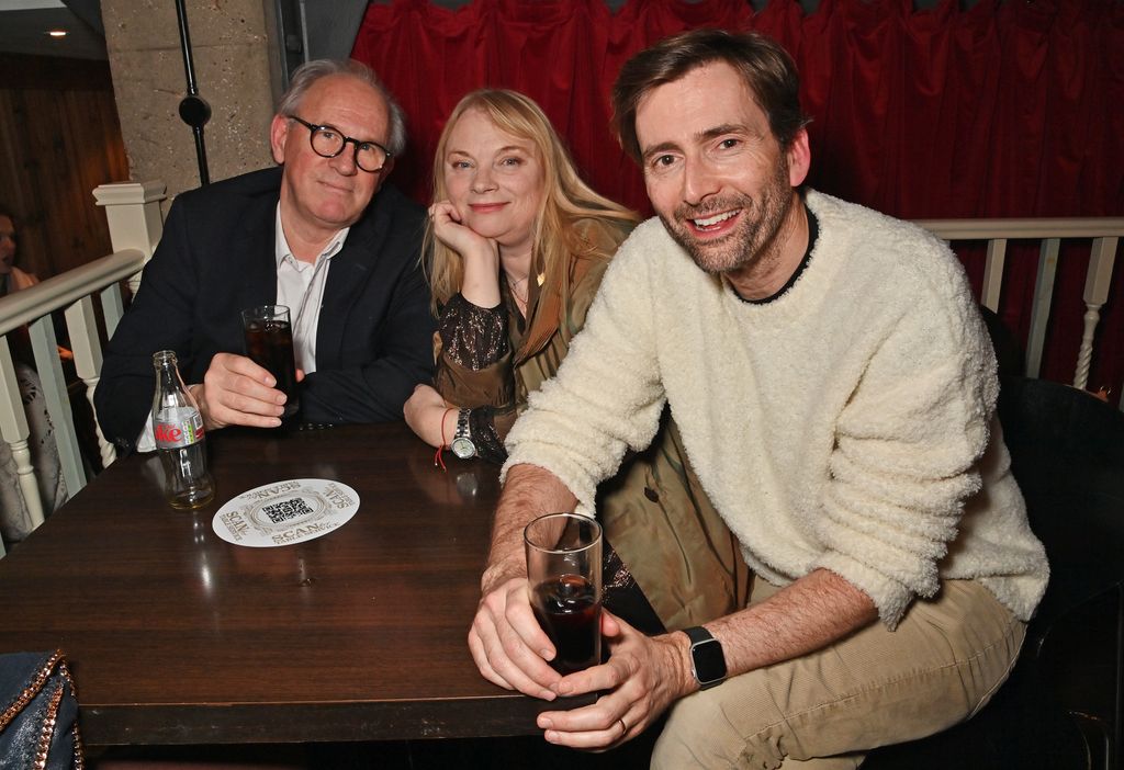 Peter Davison, Elizabeth Morton and David Tennant sitting around a table