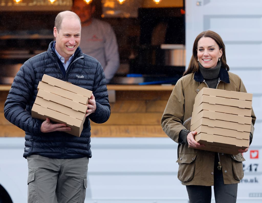 kate middleton wearing barbour coat with prince william in wales