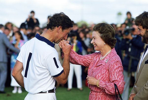King Charles kissing his mothers hand at the polo