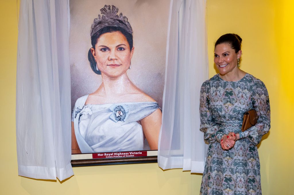 Crown Princess Victoria smiles at portrait unveiling