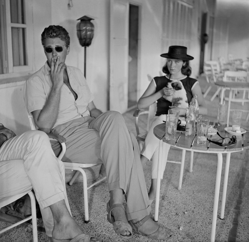 Crown prince Leka smoking a cigarette with a woman