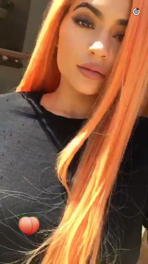 Kylie wearing peach wig