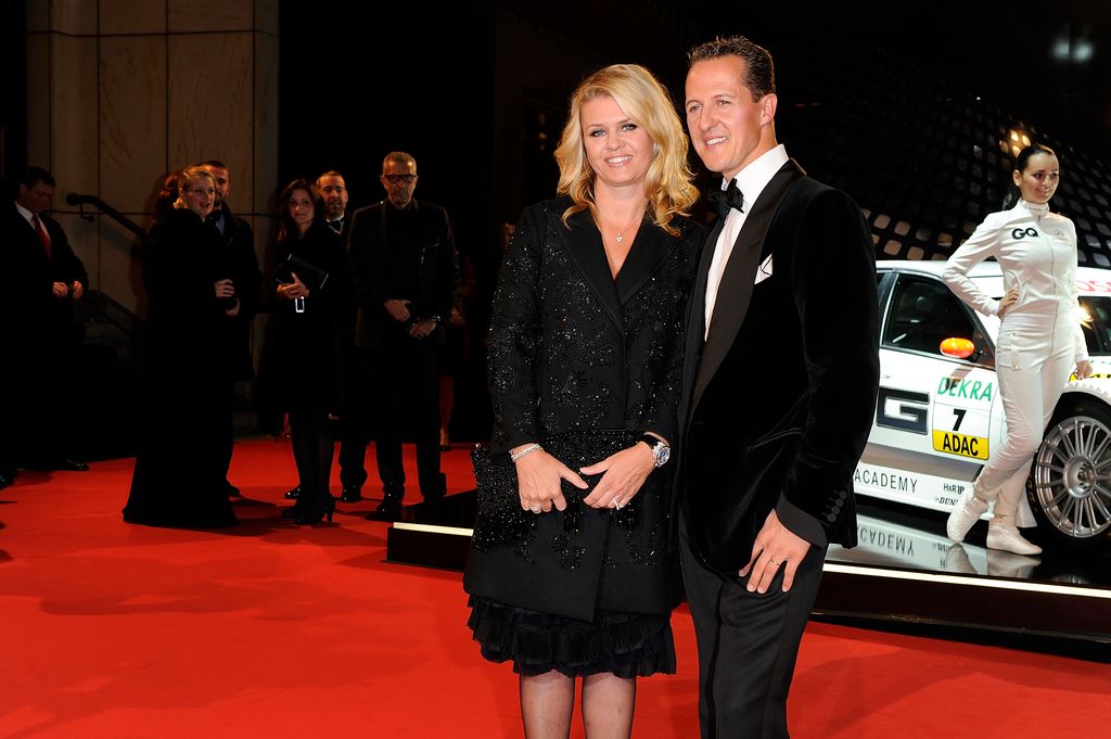 Michael Schumacher and wife Corinna Schumacher attend the GQ Men Of The Year 2010 award ceremony at Komische Oper on October 29, 2010 in Berlin, Germany.