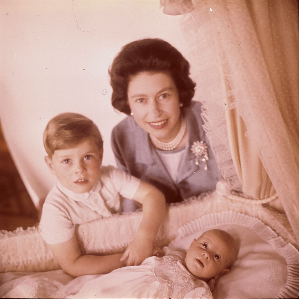 The Queen and a young Prince Andrew with a baby Prince Edward