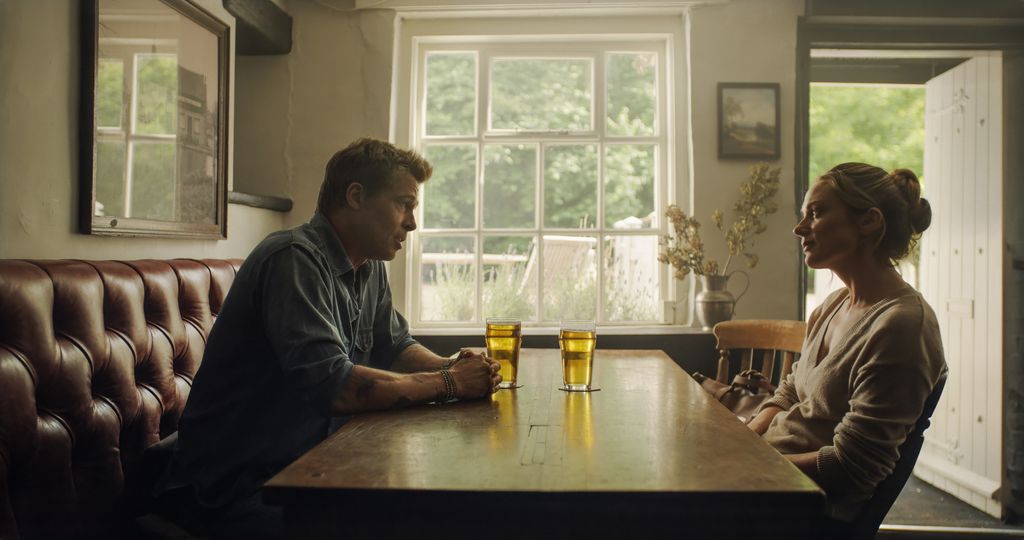 Brad Pitt as Sonny Hayes and Kerry Condon as Kate in Apple Original Films’ “F1 The Movie,” now in cinemas and IMAX.