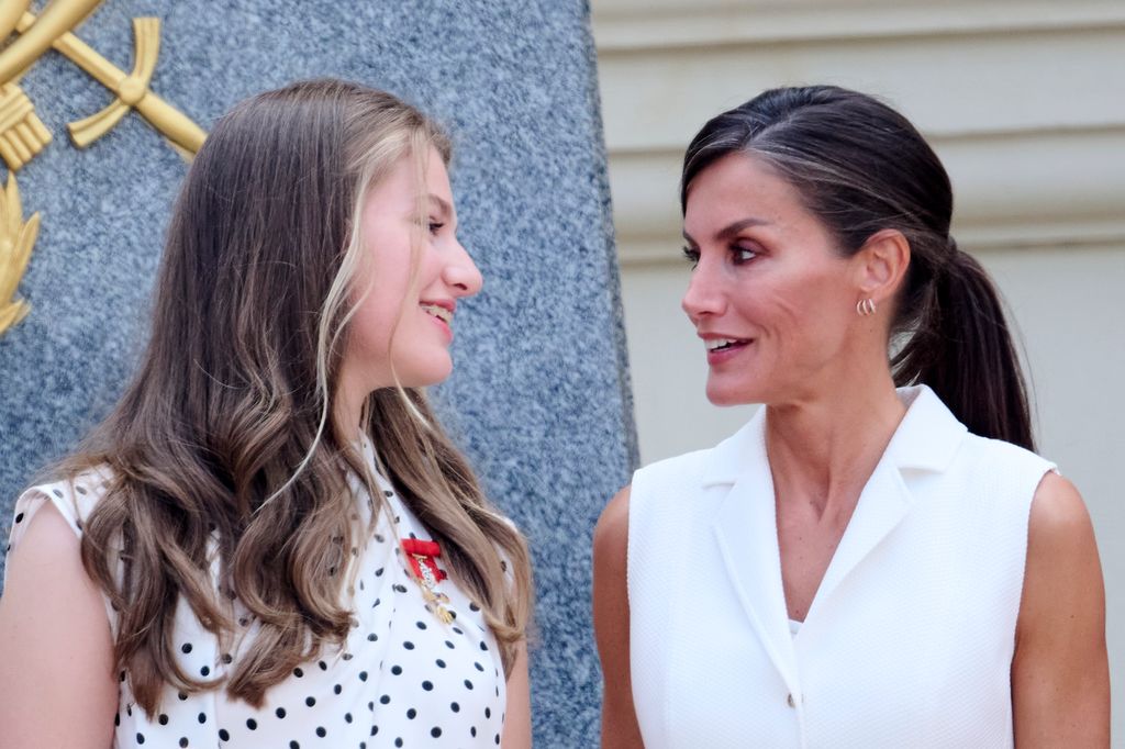 Letizia wore her hair tied back into a sleek ponytail