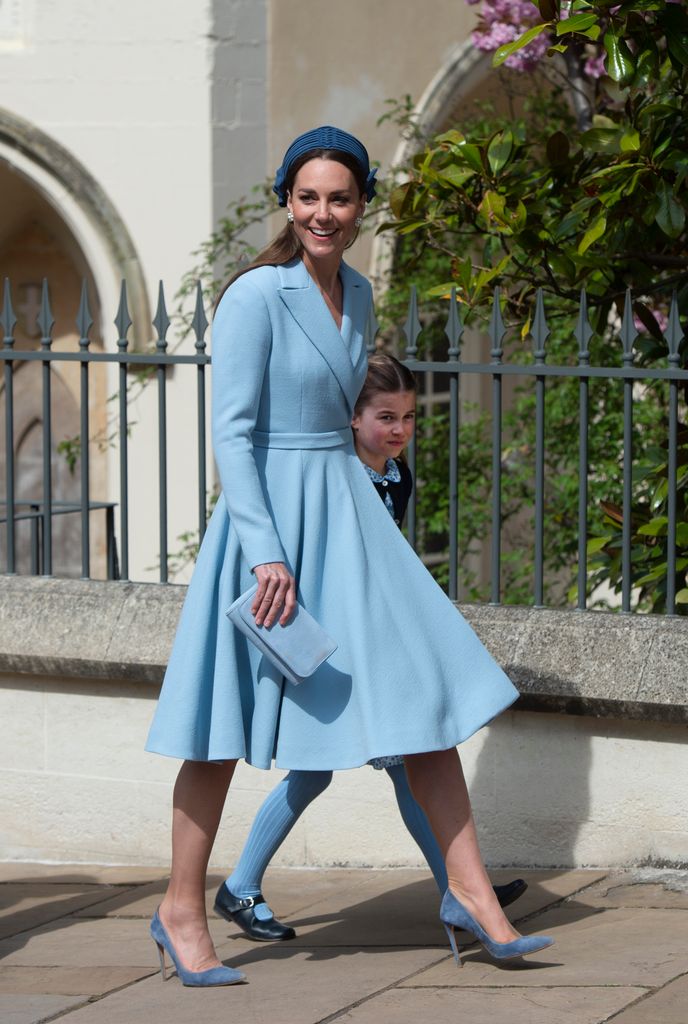 The Duchess of Cambridge with Princess Charlotte attend the traditional Easter Sunday Church service at St Georges Chapel in the grounds of Windsor Castle on April 16, 2022 in Windsor, England.