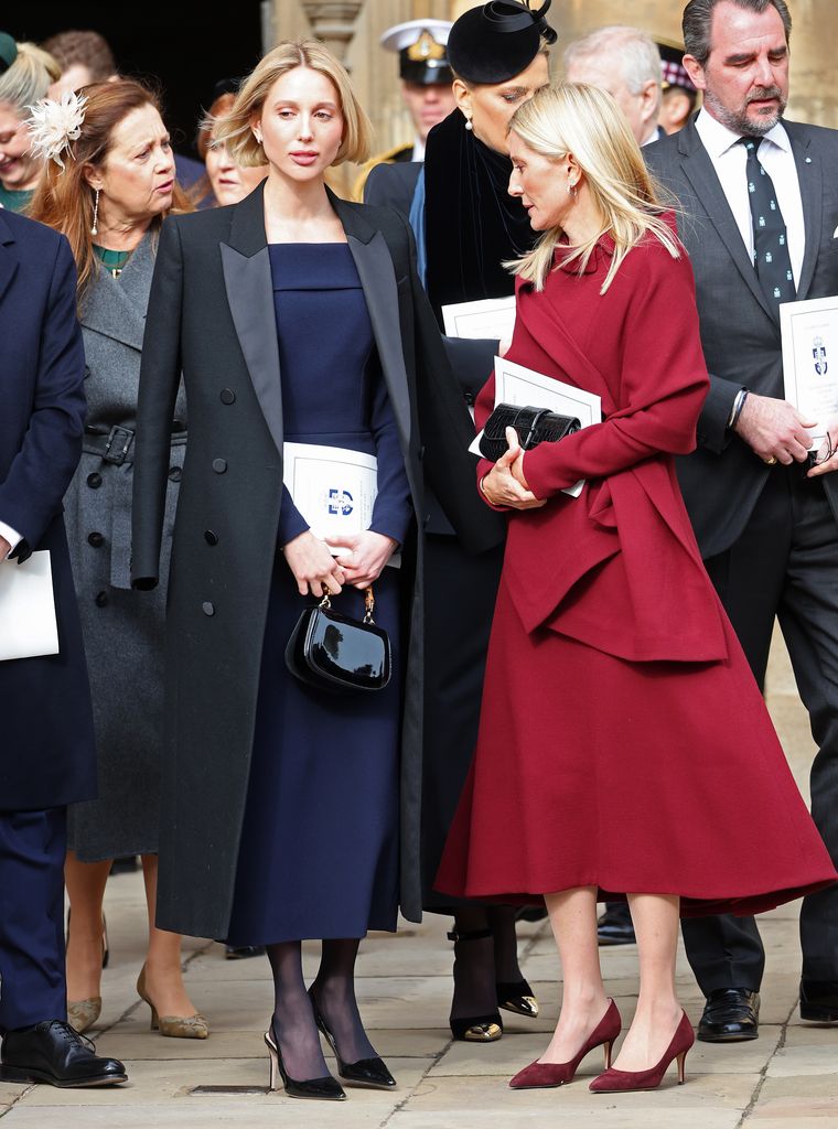 Princess Olympia in navy dress and black coat at the Thanksgiving Service for King Constantine