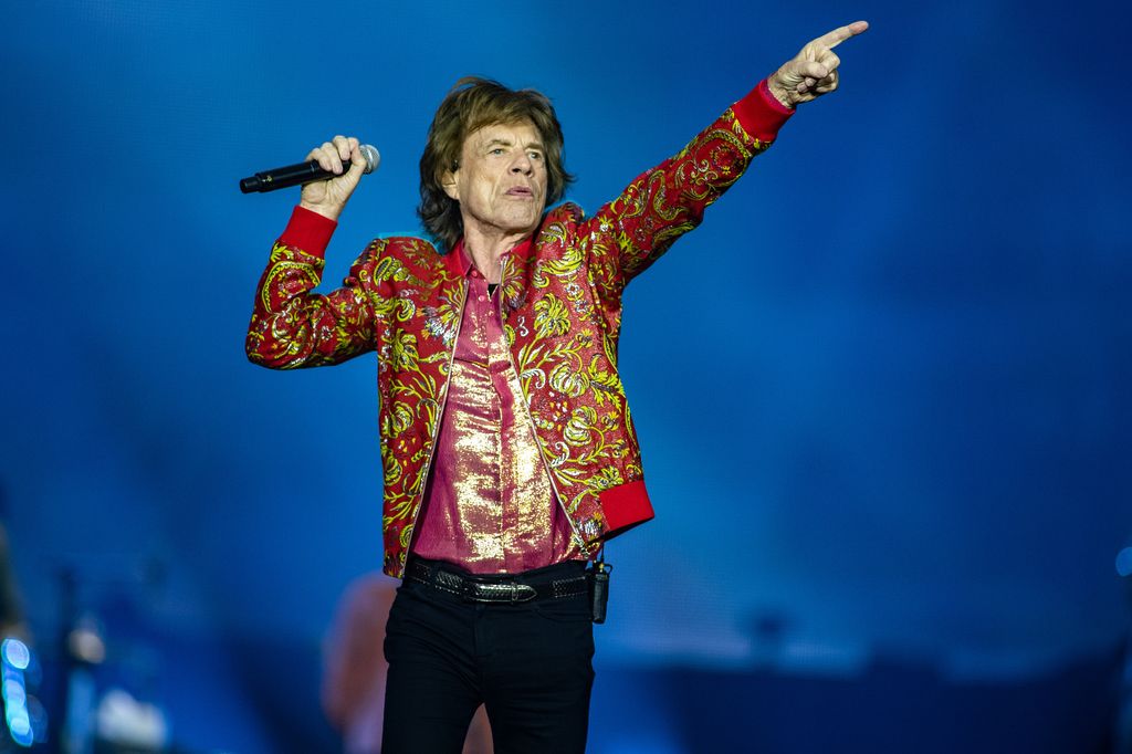 Mick Jagger on stage performing