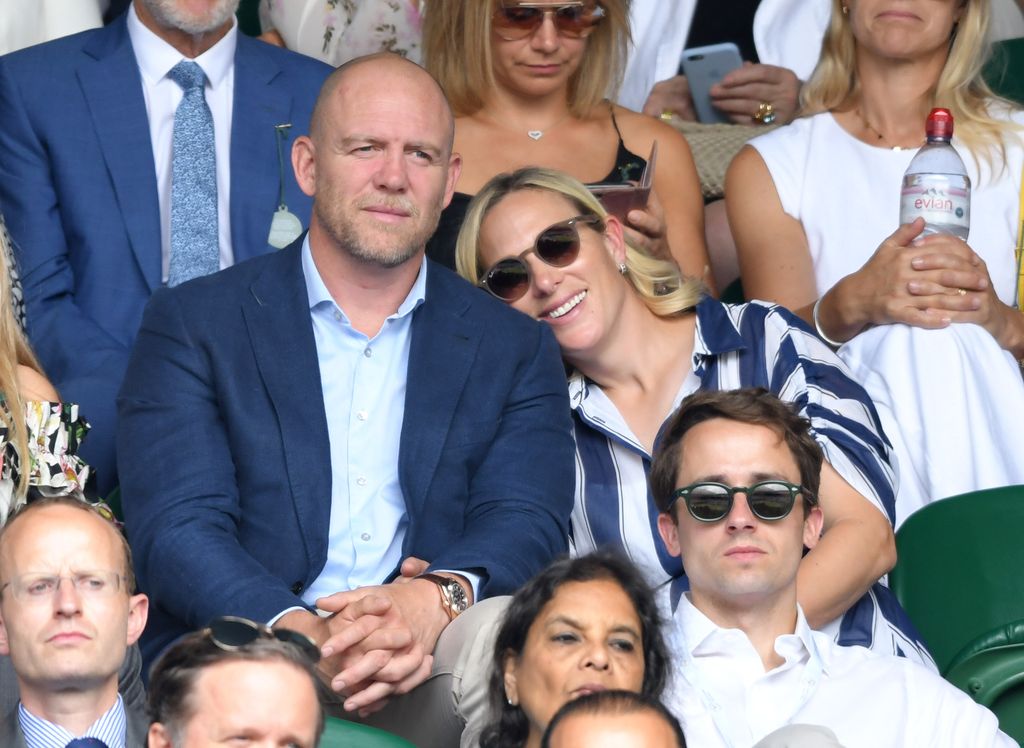 Zara with head on Mike Tindall's shoulder watch wimbledon