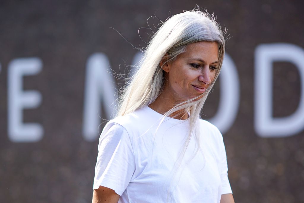 Sarah Harris with grey hair, is seen, during London Fashion Week September 2018 on September 17, 2018 in London, England.