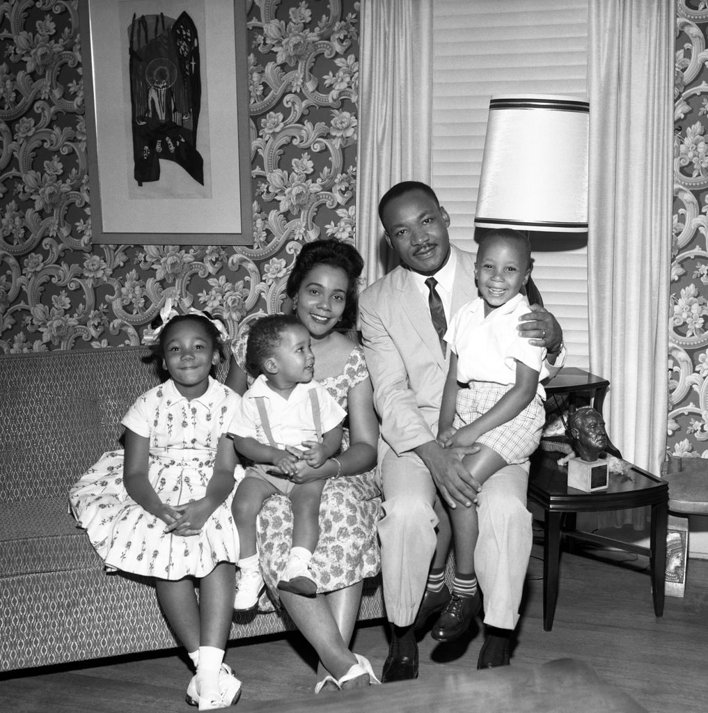 Martin Luther King Jr. (1929 - 1968) poses for a family portrait with his daughter, 7-year-old Yolanda Denise King (1955 - 2007), son, 18 months Dexter Scott King, wife American author, activist, and civil rights leader Coretta Scott King (1927 - 2006) and son, 4-year-old Martin Luther King III at their home in Atlanta, Georgia, July 1962
