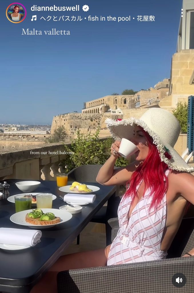 woman sipping coffee on baclony 