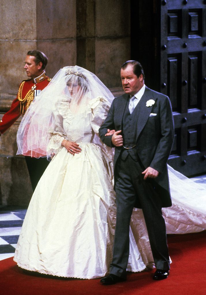 Princess Diana walking down the aisle with Earl Spencer