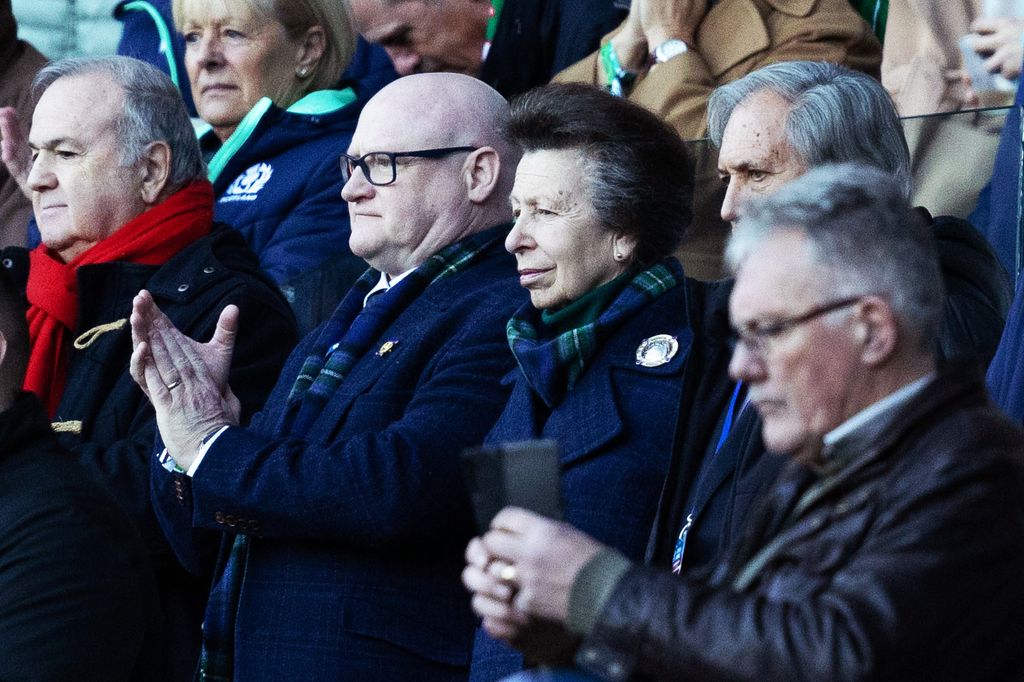 Princess Royal spotted at Murrayfield Stadium in a navy coat alongside President of the Scottish Rugby Union  Colin Rigby 