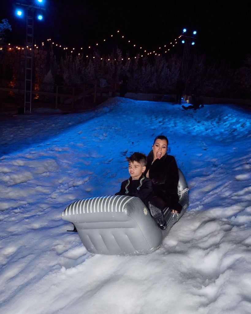 Kourtney Kardashian sledging with son Reign