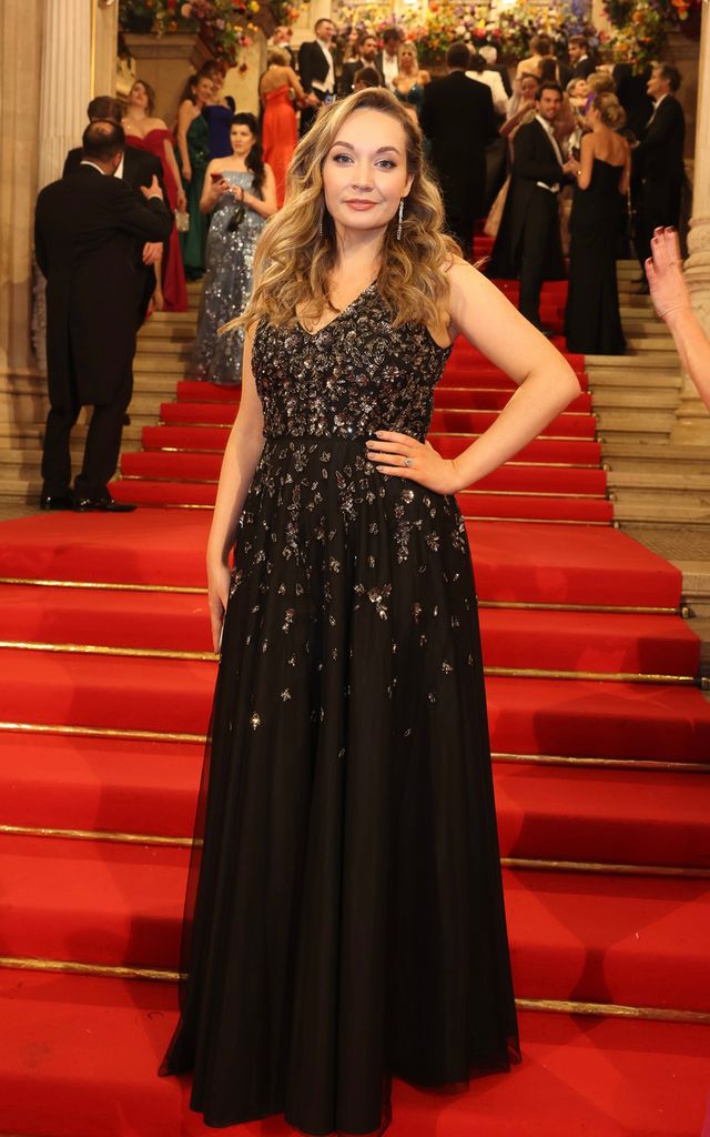 Standing on the steps of the Vienna State Opera House 