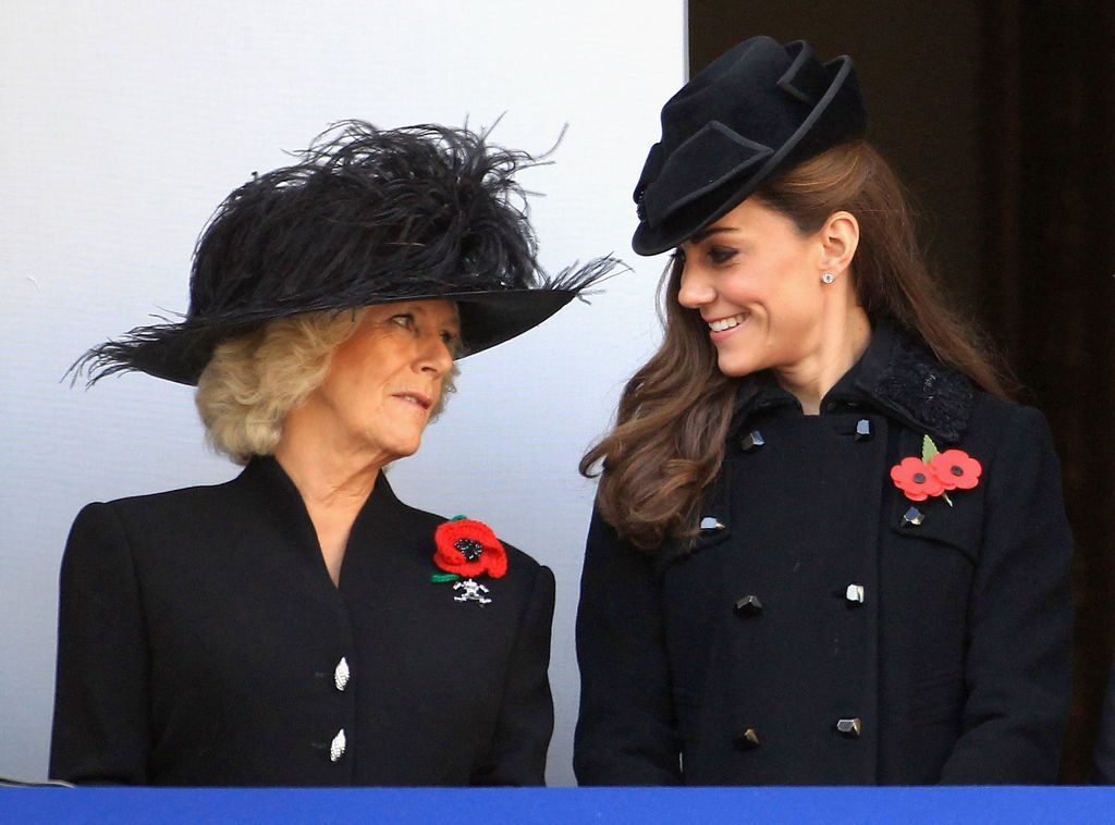 Princess Kate and Queen Camilla share a moment during Remembrance Sunday in 2011