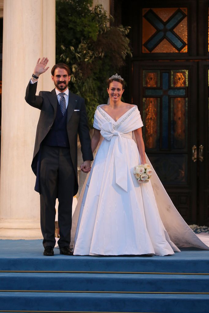Philippos of Greece and Nina Flohr leave the Church after their wedding on October 23, 2021 in Athens, Greece. (Photo By Jose Ruiz/Europa Press via Getty Images)