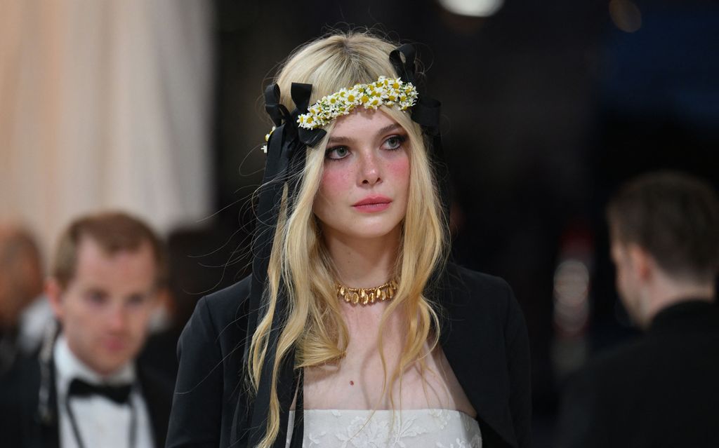 Elle Fanning wears floral headpiece to the Met Gala