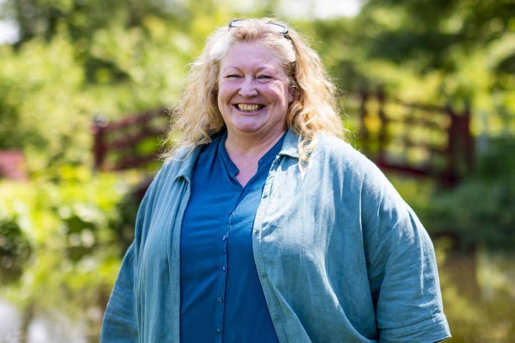 Charlie Dimmock smiling in the garden 