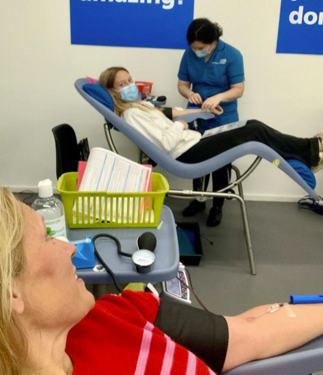 Sophie Raworth and her daughter donating blood
