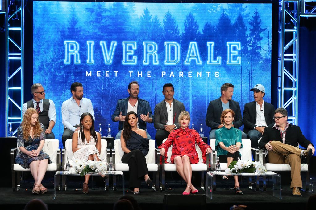 Martin Cummins, Skeet Ulrich, Luke Perry, Mark Consuelos, Lochlyn Munro, Jon Goldwater, Sarah Schechter, Robin Givens, Marisol Nichols, Madchen Amick, Nathalie Boltt, and Roberto Aguirre-Sacasa from "Riverdale" speak onstage at the CW Network portion of t