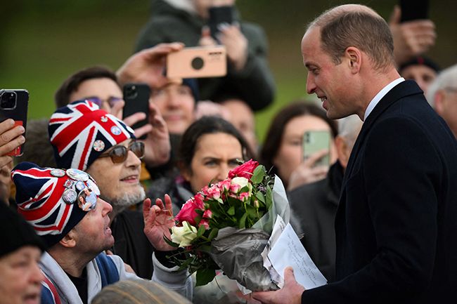 Prince William talks to locals outside church in Sandringham