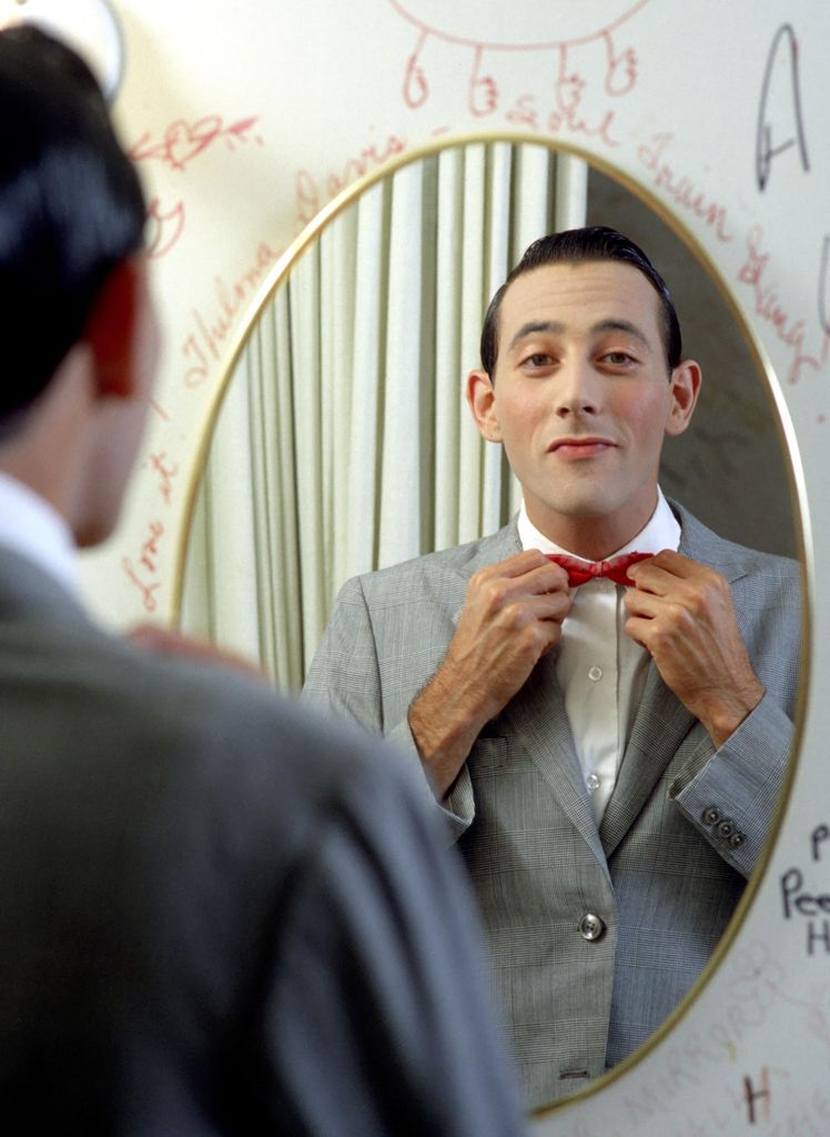 Paul Reubens poses for a portrait dressed as his character Pee-wee Herman in May 1980 in Los Angeles, California.