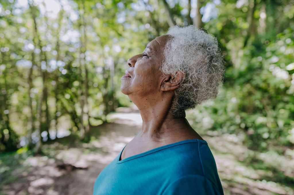 Portrait of a senior woman breathing fresh air