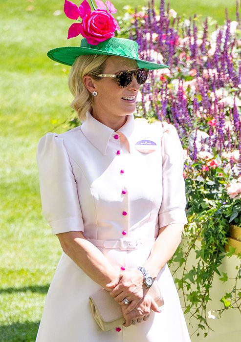 Zara Tindall wears Laura Green dress and green boater hat at Royal Ascot