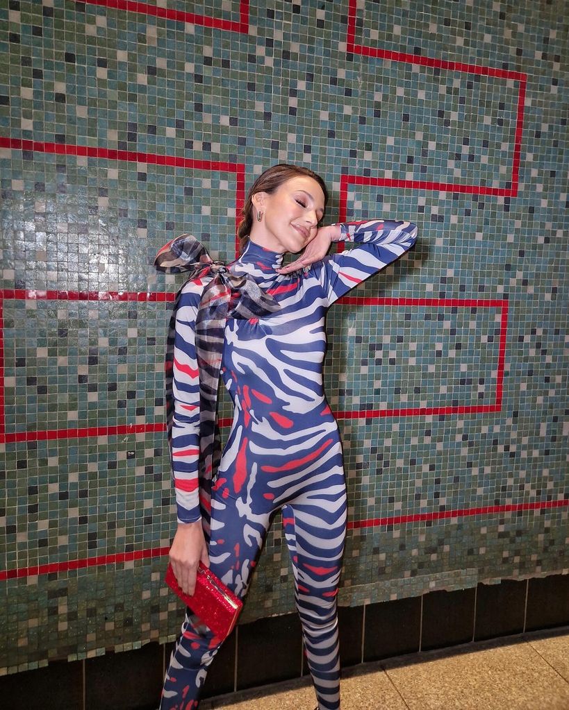 Michelle Keegan wearing a striped catsuit on Instagram
