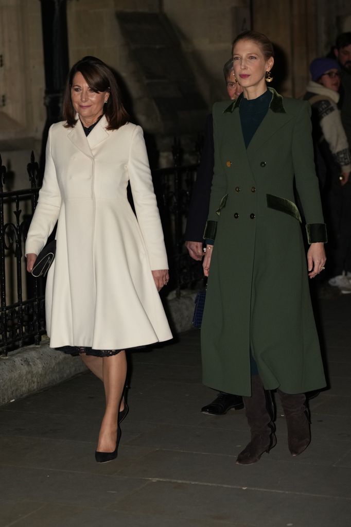 Carole Middleton walks with Lady Gabriella Kingston into Westminster Abbey for the Together at Christmas Carol Service