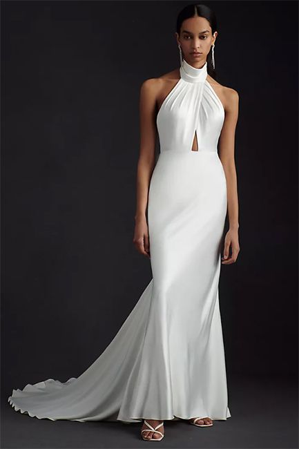 model wearing anthrolpologie keyhole white gown