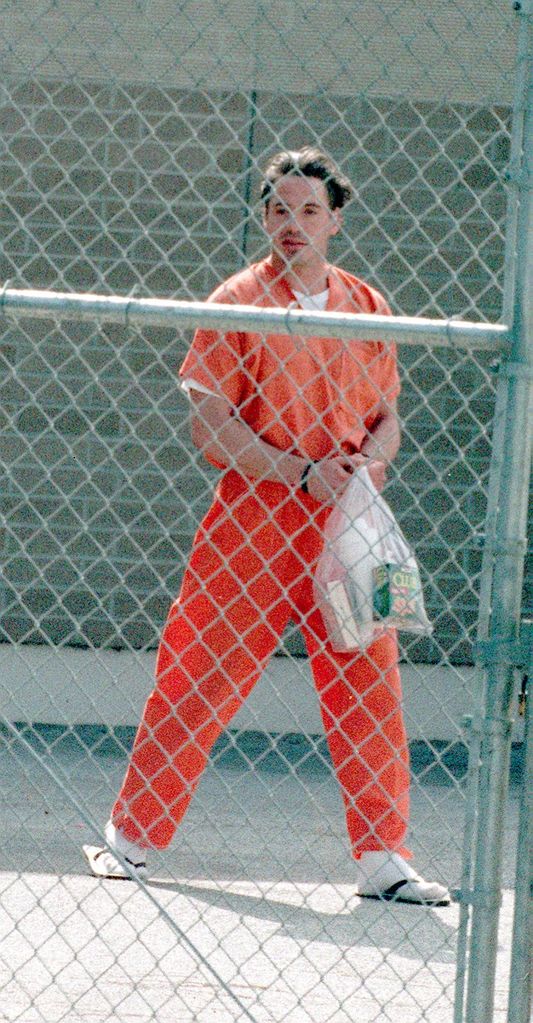 Robert Downey, Jr. walks to a bus after his hearing in Malibu CA, August 5, 1999. The actor was sentenced to 3 years in prison for violating his probation.