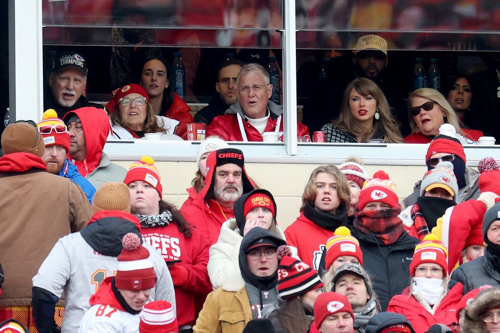 Caitlin Clark (third left) and Taylor Swift (second right) look on during the first half in the AFC Divisional Playoff between the Houston Texans and the Kansas City Chiefs