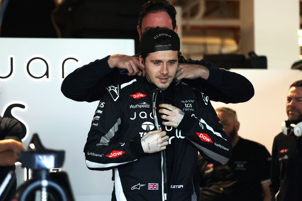 Brooklyn Peltz Beckham preparing to drive in the garage during the second day of the Formula E Evo Sessions